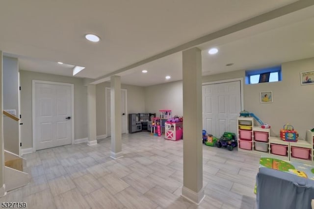 game room featuring recessed lighting and baseboards