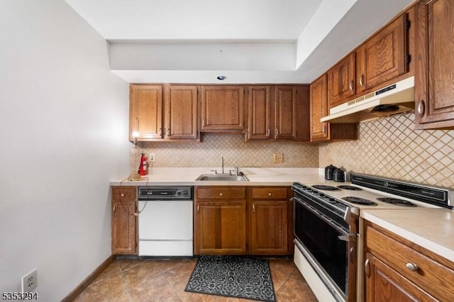 1250 N Broad St Unit A1, Hillside Twp, NJ 07205 - kitchen featuring a sink, white appliances, light countertops, tasteful backsplash, and under cabinet range hood