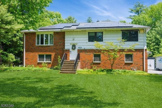 1231 Sunnyfield Ln, Scotch Plains Twp, NJ 07076 - bi-level home with a front yard, brick siding, and roof mounted solar panels