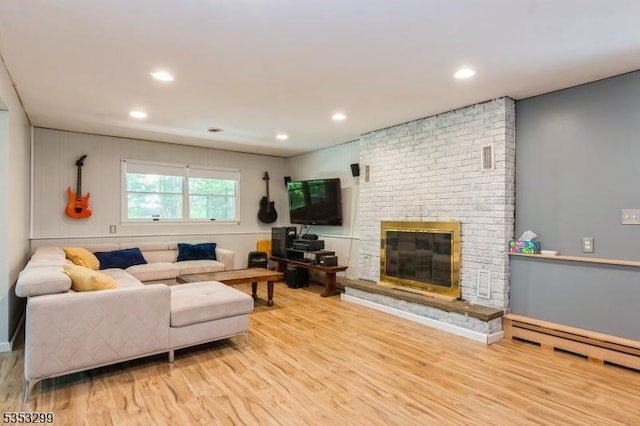 1231 Sunnyfield Ln, Scotch Plains Twp, NJ 07076 - living area featuring wood finished floors, a fireplace, recessed lighting, and a baseboard heating unit