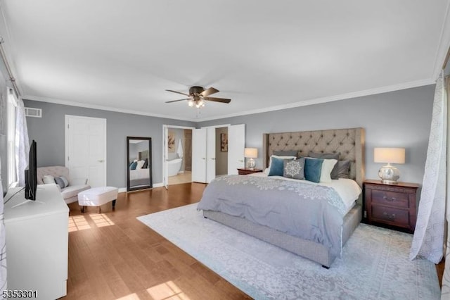 185 Flocktown Rd, Washington Twp, NJ 07853 - bedroom featuring wood finished floors, ornamental molding, a ceiling fan, and baseboards