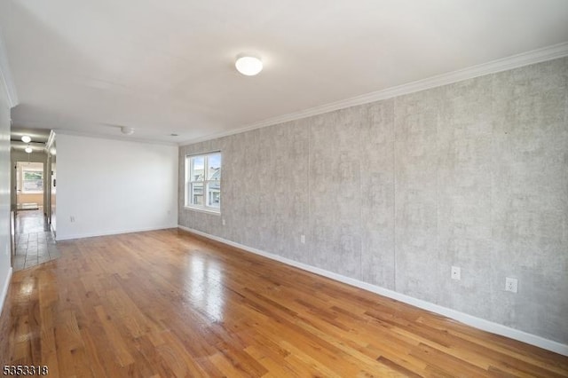 452 Fulton St, Elizabeth City, NJ 07206 - unfurnished room with wood finished floors, baseboards, and ornamental molding
