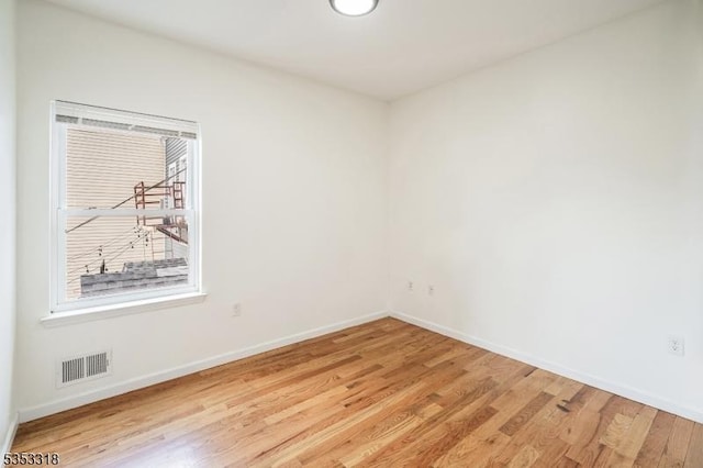 452 Fulton St, Elizabeth City, NJ 07206 - empty room with light wood finished floors and baseboards