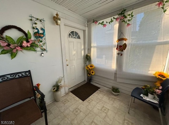 entrance to property featuring covered porch