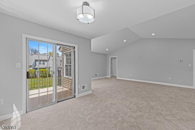 unfurnished living room featuring carpet, baseboards, vaulted ceiling, and recessed lighting