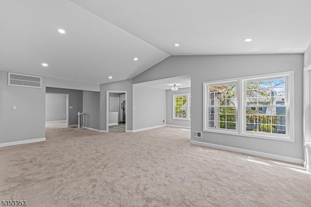 unfurnished living room with light carpet, baseboards, recessed lighting, and lofted ceiling