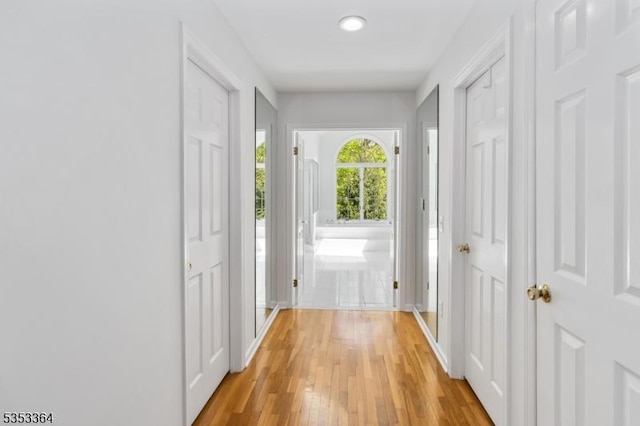 doorway featuring light wood-style floors and recessed lighting