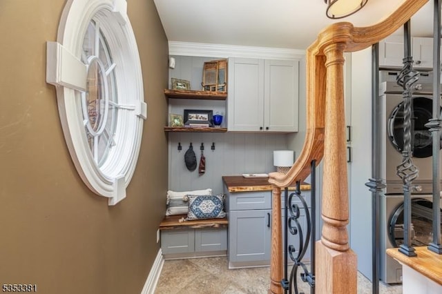 14 Jenny Ln, Vernon Twp, NJ 07461 - mudroom featuring baseboards and stacked washer and clothes dryer