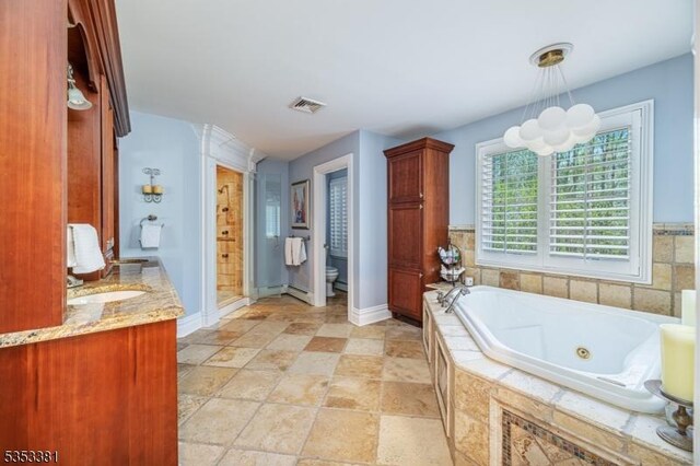14 Jenny Ln, Vernon Twp, NJ 07461 - bathroom featuring visible vents, a stall shower, baseboards, a whirlpool tub, and toilet