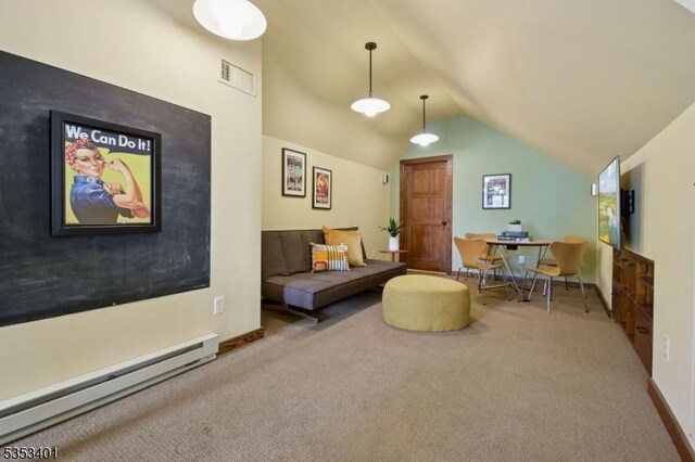 carpeted living area with a baseboard heating unit, lofted ceiling, and baseboards
