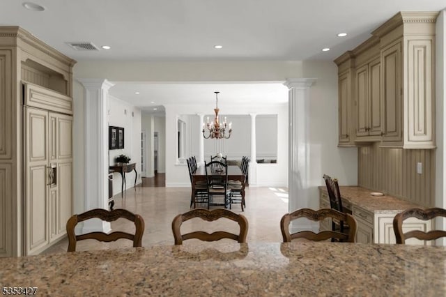 dining room featuring an inviting chandelier, decorative columns, recessed lighting, and visible vents
