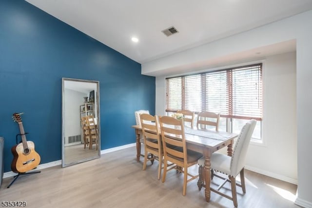 dining area featuring visible vents, baseboards, recessed lighting, and light wood-style floors