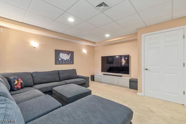 carpeted living area with recessed lighting and visible vents