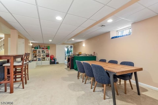 dining area featuring carpet floors, baseboards, recessed lighting, and visible vents