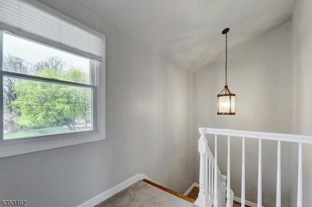 stairway with baseboards
