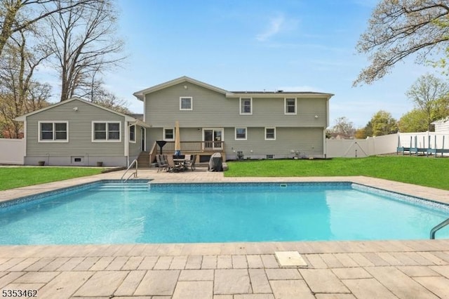 view of swimming pool featuring a fenced in pool, a yard, and fence private yard