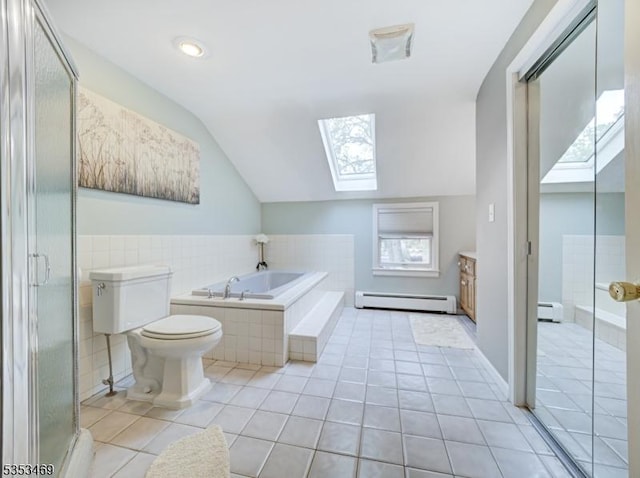 full bath with a baseboard heating unit, lofted ceiling with skylight, a bath, and tile patterned floors
