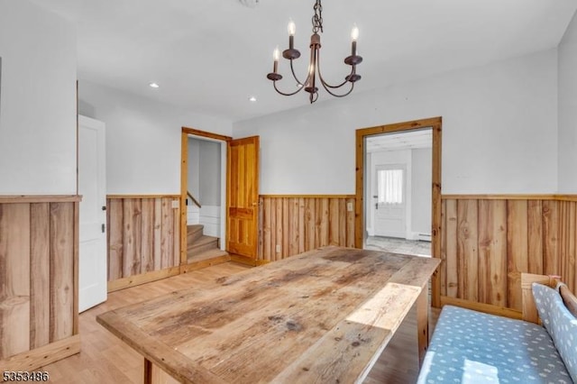 97 Belvidere Ave, Oxford Twp, NJ 07863 - dining area featuring wainscoting, an inviting chandelier, and wooden walls