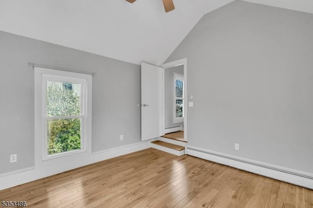 97 Belvidere Ave, Oxford Twp, NJ 07863 - spare room with lofted ceiling, ceiling fan, a baseboard heating unit, and wood-type flooring