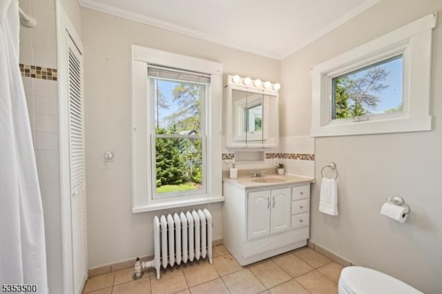 full bathroom with radiator heating unit, tile patterned floors, ornamental molding, and toilet