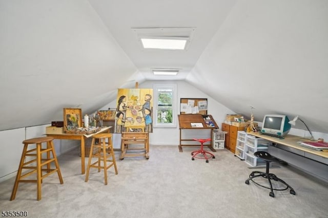 home office with carpet floors and vaulted ceiling