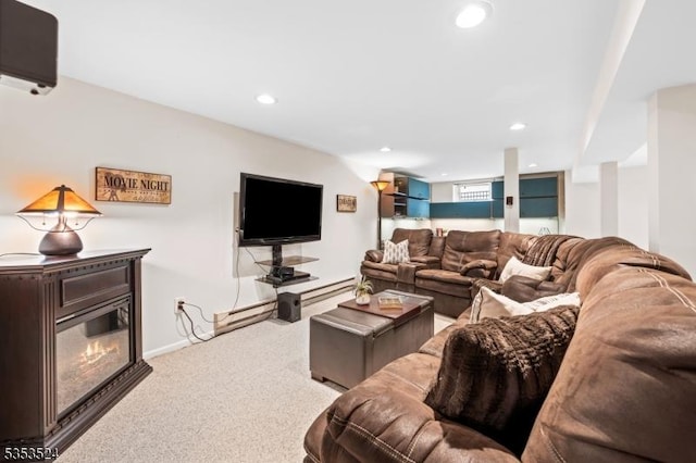 living area featuring carpet flooring and recessed lighting