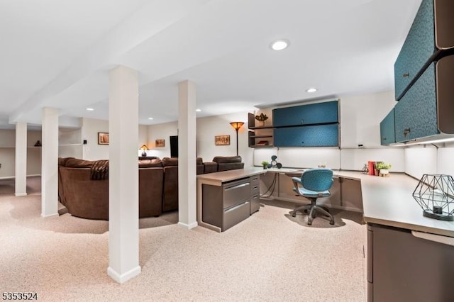 office area featuring recessed lighting, built in desk, and light carpet