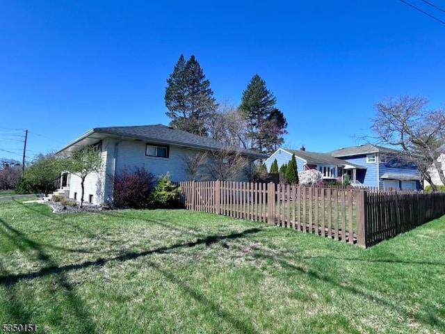 view of yard featuring fence