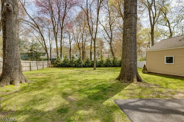 view of yard featuring fence