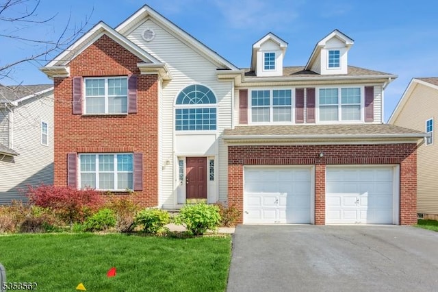 23 Schenck Ln, Franklin Twp, NJ 08873 - traditional home featuring driveway, a garage, and brick siding