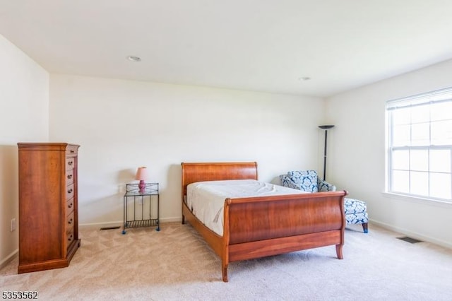 23 Schenck Ln, Franklin Twp, NJ 08873 - bedroom featuring visible vents, baseboards, and light carpet