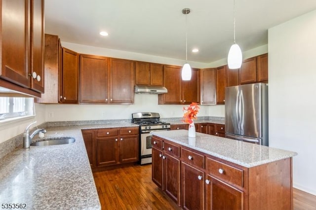 23 Schenck Ln, Franklin Twp, NJ 08873 - kitchen featuring light stone countertops, stainless steel appliances, under cabinet range hood, a kitchen island, and a sink