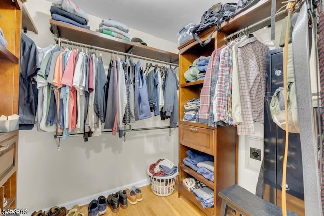 spacious closet featuring wood finished floors