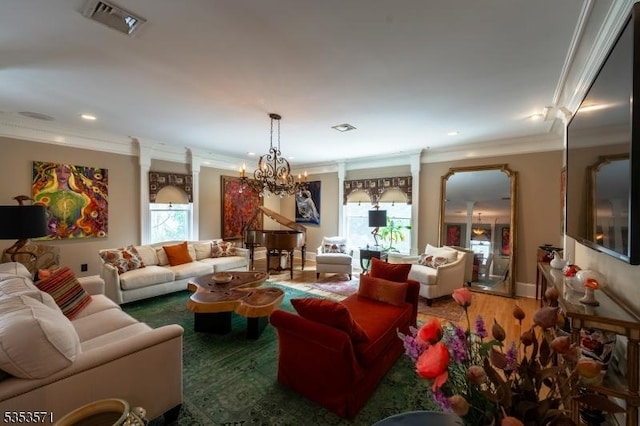 2 Natale Dr, Sparta Twp, NJ 07871 - living area with recessed lighting, visible vents, ornamental molding, and an inviting chandelier
