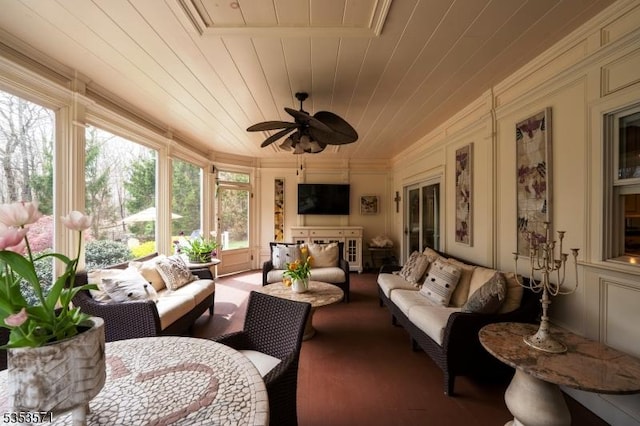 2 Natale Dr, Sparta Twp, NJ 07871 - sunroom with crown molding, a ceiling fan, a decorative wall, and outdoor lounge area