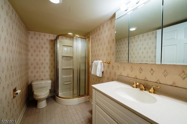 2 Natale Dr, Sparta Twp, NJ 07871 - bathroom with tile patterned flooring, vanity, toilet, baseboards, and a stall shower