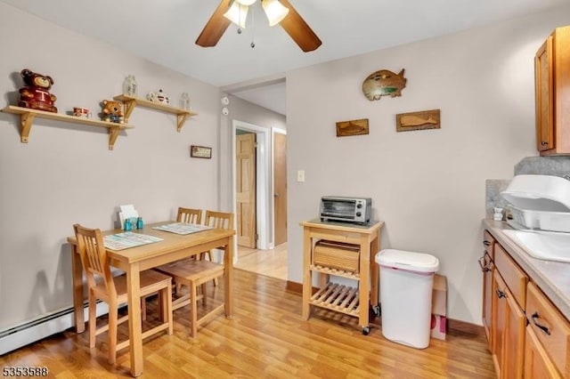 67 May St, Hawthorne Boro, NJ 07506 - dining room with ceiling fan and light wood-type flooring