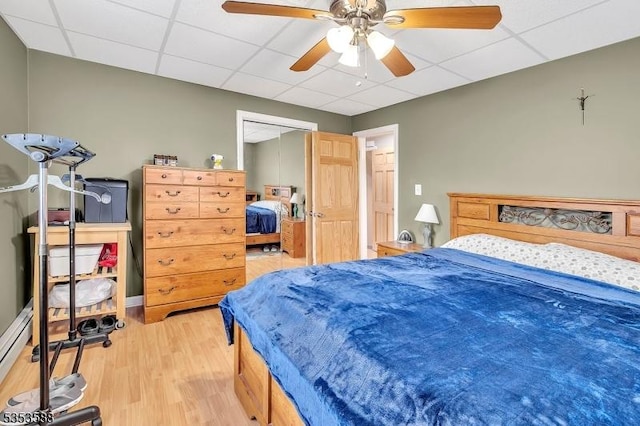 67 May St, Hawthorne Boro, NJ 07506 - bedroom with a paneled ceiling, light wood-style floors, a closet, and ceiling fan