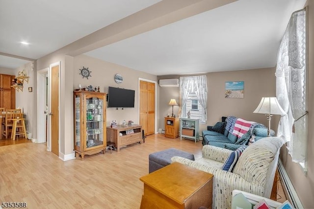 67 May St, Hawthorne Boro, NJ 07506 - living area with a baseboard radiator, light wood finished floors, and a wall unit AC