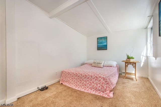 bedroom featuring light colored carpet, attic access, baseboards, and lofted ceiling with beams