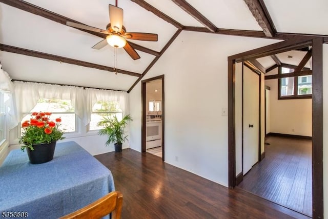 dining room with ceiling fan, lofted ceiling with beams, and wood finished floors