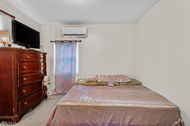 bedroom with carpet flooring and a wall mounted AC