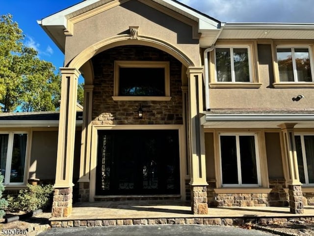 50 Perryville Rd, Union Twp, NJ 08867 - property entrance featuring stucco siding and stone siding