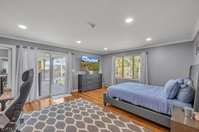50 Perryville Rd, Union Twp, NJ 08867 - bedroom with crown molding, recessed lighting, wood finished floors, and access to exterior