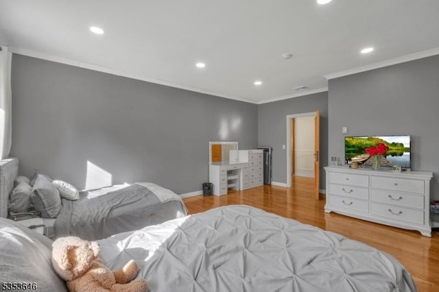 50 Perryville Rd, Union Twp, NJ 08867 - bedroom with crown molding, recessed lighting, and light wood-style floors