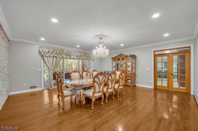 50 Perryville Rd, Union Twp, NJ 08867 - dining room with a notable chandelier, recessed lighting, wood finished floors, visible vents, and ornamental molding