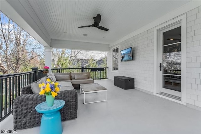 view of patio / terrace with ceiling fan and outdoor lounge area