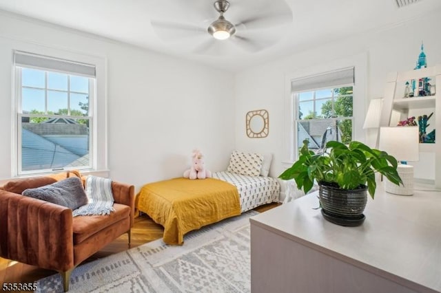 bedroom featuring ceiling fan