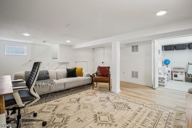 office area featuring wood finished floors, recessed lighting, and baseboards