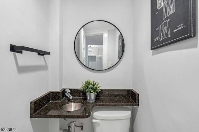 bathroom with a sink and toilet